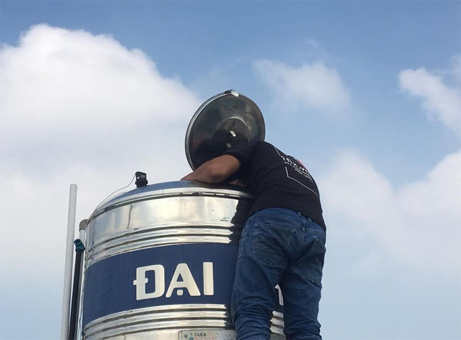 Vệ sinh bồn nước quận 6 vào ban đêm